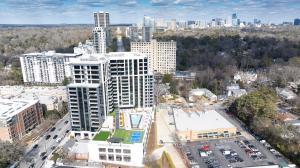 Exterior View of The Dillon Buckhead Showcasing The Pool & Pickleball Court