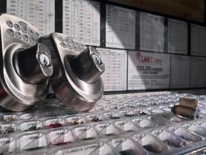 Close-up of digital keypad smart locks and rekeying tools, showcasing professional locksmith services in Las Vegas.