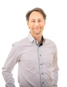 Torso shot of Mike Fink, author and coach, known for "Divorce Decision Decoded" and The Decoding Grid™ decision-making framework
