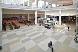 Blocks of epoxy terrazzo design neutral tones in the Orlando International airport, installed by the David Allen Company 