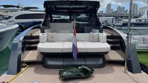 1 Ocean Yachts displays SeaNXT Elite carbon fiber sea scooter aboard boat platform at Miami Boat Show 2025.