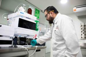 SGS technician at work within the company’s VOC testing lab