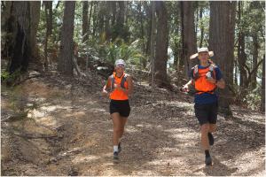 two runners enjoying running stage of Adrenalin Quest adventure race