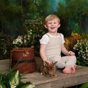 Adorable Photo by Dream Capture Photography with live bunnies and ducks at Big Rock Creek's Spring Boutique