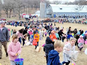 Kids race for eggs during the Egg Hunt at Big Rock Creek's Spring Boutique