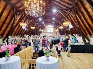 Guests Shopping in the barn at Big Rock Creek's Spring Boutique in St. Croix Falls, Wisconsin