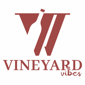 Red and white logo of a bottle of wine between two V's, representing Vineyard Vibes