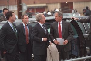 Senator Joe Lieberman and President George W. Bush Exit the Presidential Limousine