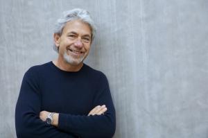 Headshot of Louie Schwartzberg