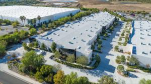 An aerial photograph of industrial and commercial office buildings.