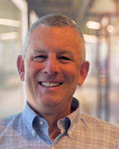 Neal Solomon, Senior Vice President, Argon & Co close up photo man smiling at camera