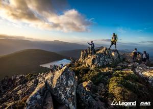 Teams enjoy sunset on the summit of Hartz Peak