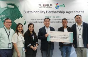 Executive Members of FUJIFILM BI PH smile as they presented check for initial tree-planting project with FEED Inc