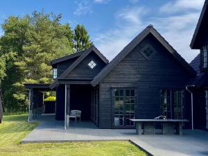 Træhuse fra 3Huse: Fremtidens Energieffektive og Moderne Helårshuse