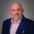 PATRICK RICCARDS SELECTED AS TOP BUSINESS LEADER OF THE DECADE BY IAOTP