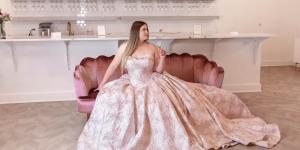 Bride wearing a blush wedding dress at Heart to Heart Bride