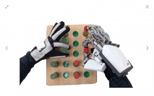 Showing HandVivante™ MirrorHand Exoskeleton System performing hand rehabilitaiton exercise