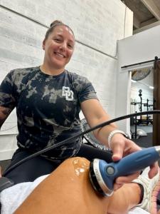 Dr. Jaime Gold with the PiezoWave2 Shockwave device