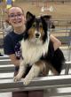 Merit Academy Student & Dog Go Big