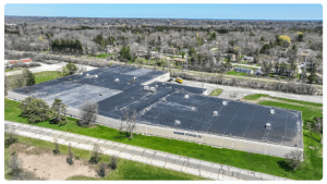 Aerial view of the 14-acre site and 203,000 SF industrial facility at 8100 N Teutonia Ave, Brown Deer, WI, acquired by New Blueprint Partners.