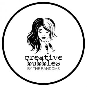 Logo for Creative Bubbles by The Randoms, featuring a stylised woman's face with hair that is dark on one side and light on the other, representing the two founders. Below the face are two champagne flutes toasting, with the stems formed from the founders