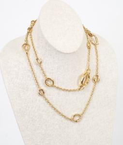 Gucci signed 18k yellow gold bamboo link station necklace, nearly 28 inches long, stamped 750 and weighing 44.0 grams (Estimate: $7,000-$9,000).