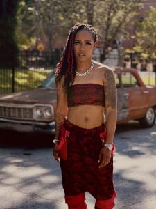 Ray Gifted Keys in a bold red outfit on set, giving her fans a glimpse behind the scenes of her "Wrong One" release.