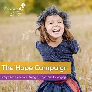 A child named Zeesy, helped by Shodair's Genetics Department, representing the Hope Campaign and Shodair's mission to provide every child with strength, hope, and belonging.