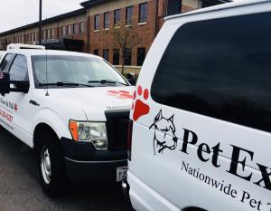 2 vans white with the words pet express on them