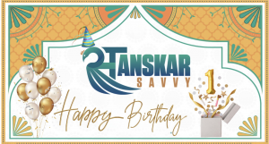 Sanskar Savvy 1st anniversary celebration image featuring logo with festive party hat, gold balloons, and gift box – marking one year of spotlighting Gen Z South Asian culture, entertainment, and diaspora events across North America.