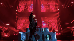 A.R. Rahman singing on stage under vibrant lights during a live concert, ahead of his 2025 Wonderment Tour in North America. Sanskar Savvy is the official Gen Z South Asian media partner for the tour.
