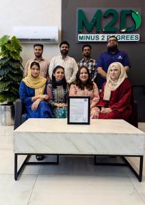 The M2D team celebrating having received their ISO Certification