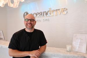 Dr. Edgar Sosa, Board Certified Plastic Surgeon standing inside Ocean Drive Plastic Surgery