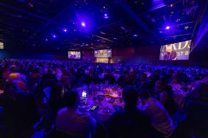 A large venue packed with attendees