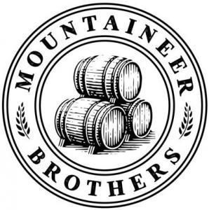 Mountaineer Brothers logo featuring stacked wooden barrels inside a dark blue circle with wheat sprigs on a gold background.