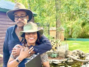 Sweet Valley Ranch, a 300-acre agritourism destination in Fayetteville, North Carolina, is proud to announce the launch of Sweet Valley Ranch Farmhouse Retreats Sweet Valley Ranch owners Fred and Anita Surgeon enjoy a quiet moment outside one of the guest cabins, just steps from the koi ponds.