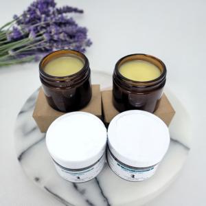 an AI generated product image of the sisters' topical salve, two opened jars