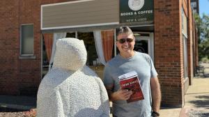 Author Richard R. Becker in front of The Atlas Collection in Moline, Illinois