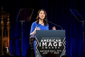 Emcee Scarlet Fu of Bloomberg TV opens the 2025 American Image Awards