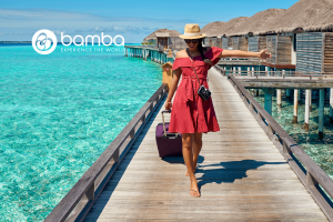 Happy female influencer on vacation - Bamba Travel