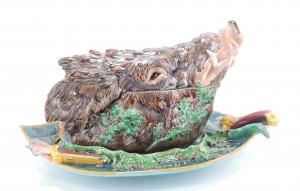Monumental and rare Minton majolica boar’s head tureen with matching fitted tray, shape no. 2141, 22 inches long, the rarest of all Minton majolica game tureens. Estimate: $20,000-$30,000