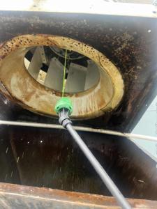Exhaust Duck being power washed after being pre-treated with industrial strength degreaser