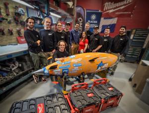 All members of OMER 13 team with Olivier Rocheleau from Outillage Placide Mathieu and Marie Secco from Milwaukee Canada, at the club's workshop at ÉTS in Montreal.