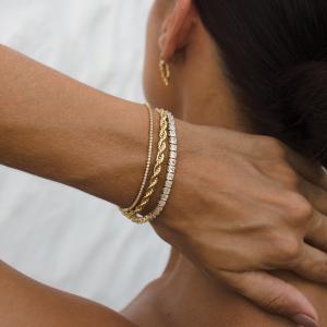 Gold-filled hypoallergenic and waterproof bracelets by Velani Jewelry shown on wrist, ideal for beach-to-work wear in Guam’s humid climate.