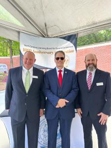Left to Right, Eric Reichard, Chair NCLBGC, Executive Director Ryan Cody, Senator Steve Jarvis..