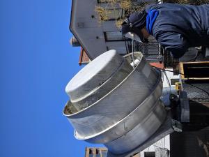 Hood Cleaning Technician Cleaning a Commercial Exhaust System in South Florida