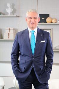 Dr David Samadi standing hands in pockets