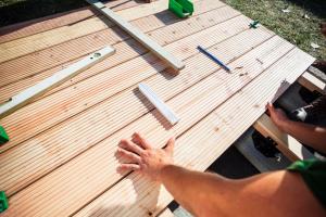 man working on ipe wood deck