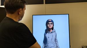 Virtual On Holographic AI Presenter engaging with a live audience through interactive hologram technology.