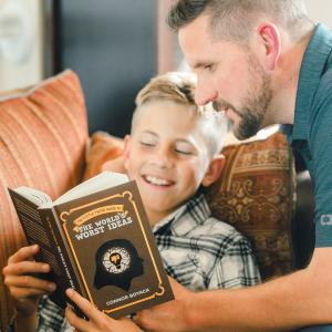 Father and son reading.